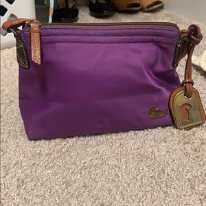 Dooney and Bourke purple vinyl small bag